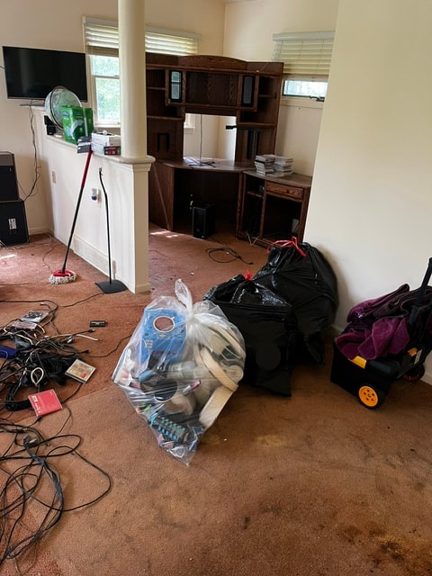 Old worn carpet before flooring replacement